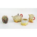 A Royal Venton ware pottery three-piece tea set modelled as elephants includes tea pot, cream jug
