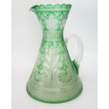 A late Victorian green glass cordial jug by Stevens & Williams, Stourbridge, of waisted form with