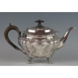 A late Victorian silver teapot, maker Albert Henry Thompson, Sheffield, 1894, crested, of lobed oval