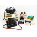 A Zenith B 35mm SLR camera, together with assorted camera accessories.
