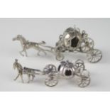 A continental miniature silver model of a horse drawn carriage in the form of a pumpkin, 10cm long