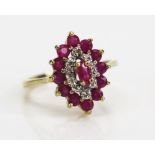 A 9ct Gold, Ruby and Diamond Marquis Shaped Ring, hallmarked, 15.5x12mm, size K.5, 2.32g