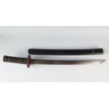 A Japanese wakizashi, with 45cm single edged blade, having a circular iron tsuba, with ray skin