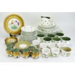 A Susie Cooper part dinner and tea service with 'One o'clock' pattern decoration, a 'Sunflower'