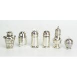 Six assorted silver peperetttes, various makers and dates including continental silver churn-