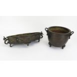 A Chinese Bronze Two Handled Jardinière (15cm high x 22cm wide to handles) and a planter (36cm.