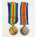 A World War One pair to 158466. Pte. H.W. Searle. M.G.C., War and Victory medals.