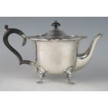 An Edward VII silver bachelors teapot, maker Levesley Brothers, Sheffield, 1904, of circular form,