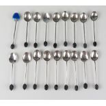 A collection of eighteen silver bean topped coffee spoons, various maker and dates, gross weight