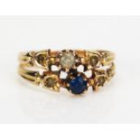 An 18ct Gold Dress Ring set with blue and white stones and untested pearls, stamped 18CT, size J, 2g