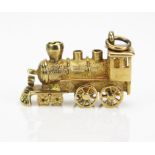 A 9ct Gold Locomotive Charm with both rear axles moving, hallmarked, 4.24g