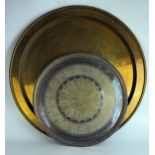 A Benares brass circular tray or tiffin table top, decorated with elephant, birds and animals,
