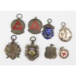 A collection of seven assorted silver sports and other medals and fobs, various makers and dates,