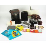 A Zeiss Ikon Contaflex 35mm camera, spare lens, filters and accessories together with an Ica