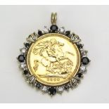 A QEII Gold Half Sovereign in an unmarked yellow metal and stone set pendant mount, 6.52g