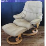 A contemporary Scandinavian Ekornes Stressless reclining armchair and matching ottoman footstool