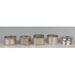Five assorted silver napkin rings, various makers and dates, total weight of silver 90gms, 2.91ozs