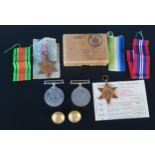 A group of four World War II medals includes Atlantic Star, 19139-45 Star, War and Defence Medal