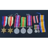A collection of World War II medals, includes 1939-45Star, Africa Star, a Defence Medal two War