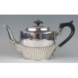 A Victorian silver oval teapot, maker Barker Brothers, Birmingham, 1899, with half reeded