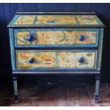 A decoupage decorated chest of two long drawers, raised on square legs, 86cm wide, 81cm high, 44cm