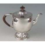 A George V silver teapot, maker Fenton, Russell & Co Ltd, London, 1910, of ovoid form, the hinged