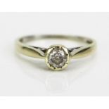 A 9ct White Gold and Diamond Solitaire Ring, c. 4.2mm illusion set stone, continental marks, size