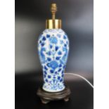 An Antique Chinese blue and white vase of 40cm. ovoid form decorated with Fenghuang among