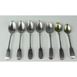 Seven assorted silver Fiddle pattern teaspoons, various makers and dates, crested and initialled,