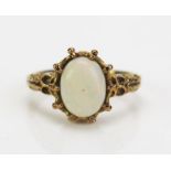 A 9ct Gold and Singlet Opal Dress Ring, c. 9x7mm stone, stamped 9CT., size K, 2.73g