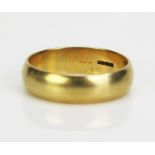 An 18ct Gold Plain Wedding Band, stamped 750, 5mm wide, size M, 4.14g