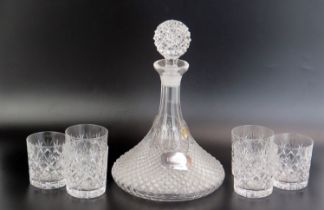 A crystal glass ships decanter and stopper, with hobnail decoration, with silver brandy label and