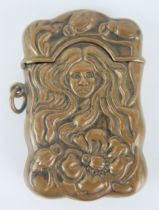 A reproduction pressed brass vesta case, of Art Nouveau influence, 6.5cm long.