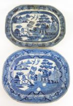 A 19th century Staffordshire pottery meat dish with blue and white Willow pattern transfer print