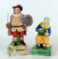 Two pearlware pottery figures, seated woman and portly cavalier, 15cm and 21cm high.