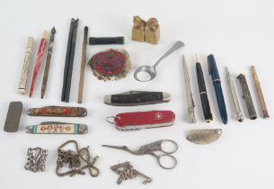 A collection of assorted propelling pencils, pen knives and other collectables.