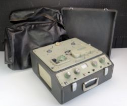 A Ferrograph Model 633 reel to reel tape recorder, with two reels of tape,