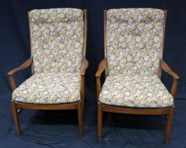 A pair of 1960's Parker Knoll Florian range elbow chairs with padded upholstered backs and seats,
