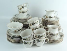 A Royal Doulton part tea and dinner ware with 'Larchmont' transfer print decoration, includes dinner
