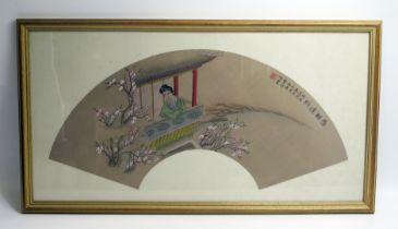 A Japanese hand painted fan leaf, decorated with a courtesan on a balcony surrounded by cherry