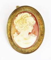 A 9ct Gold and Shell Cameo Brooch with the bust of a female, 52x42mm, hallmarked, 14.45g