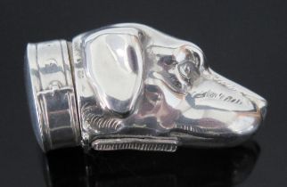 A silver novelty vesta case, in the form of a dogs head, stamped 925, 5cm long, 37gms, 1.21ozs
