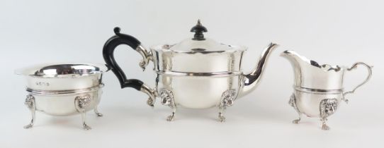 A matched three piece tea service, maker William Bruford & Son, London 1928 and Birmingham, 1908, of