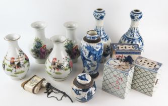 A pair of Chinese 20th century blue and white vases, four other vases, ginger jar and cover, bone