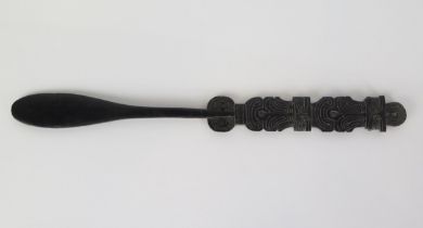 A Massim lime spatula, Trobriand Islands, Papua New Guinea, the handle with pierced and incised