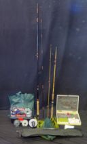 A collection of trout fishing equipment - includes two carbon fibre rods, five centre pin reel,