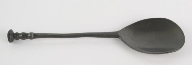 An 18th century pewter seal top spoon, with pear-shaped bowl and slender stem, bears worn touch