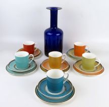 A Susie Cooper six setting tea service with cups, saucers and side plates, together with a large
