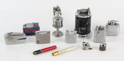 A collection of assorted lighters and table lighter, various manufacturers.