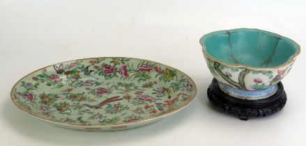 A late 19th century famille verte oval dish decorated with birds amongst flowers, together with a